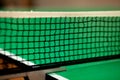 Close up ping pong net and line - green table Royalty Free Stock Photo