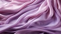 A close up of a pink fabric background