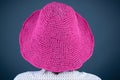 Close up of a pink handmade beach hat on a girl.