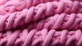 A close up of a pink knitted fabric