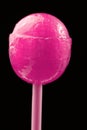 Pink Lollipop Close-Up on Black Background