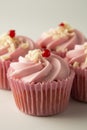 Close up pink, strawbery, fruit cupcakes isoalted. Sweet dessert, shortcakes with cream. Birthday food, cake, muffin. Tempalte for Royalty Free Stock Photo
