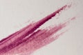 close up of pink watercolor paint stroke on white paper texture background Royalty Free Stock Photo