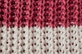 Close up of pink and white knitted wool texture Royalty Free Stock Photo