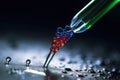 close-up of pipette, with droplets of liquid being dispensed onto the surface