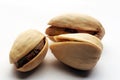 Close up on pistachio nuts on white. Royalty Free Stock Photo