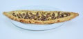 Close up of a pita bread with minced meat, cheese served on plate Royalty Free Stock Photo