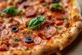 close-up Pizza with Mozzarella cheese, salami, pepper, pepperoni, olives, Spices and Fresh Basil. Italian pizza Royalty Free Stock Photo