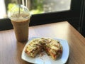 close up pizza pice paste on white dish and ice coffee