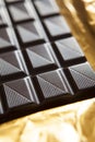 Close Up Of Plain Chocolate Bar On Foil Wrapper Royalty Free Stock Photo
