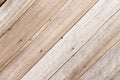 Plank wood skin patterns with diagonal texture abstract on light brown background Royalty Free Stock Photo