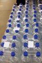 Close-up of  plastic bottles of mineral water in  shop Royalty Free Stock Photo