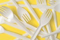 Close-up of plastic Forks on yellow background . Royalty Free Stock Photo