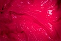 close up plastic pink color of oil paint.