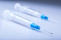 Close-up of plastic syringe on white background.