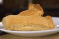 Close up of a plate with bisquit typical andean food region, sponge biscuits of Cayambe, Ecuador in a blurred background