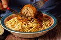 close-up of a plate of meatballs with spaghetti with cutlery Royalty Free Stock Photo