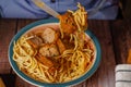 close-up of a plate of meatballs with spaghetti with cutlery Royalty Free Stock Photo