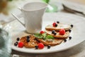 A close up of a plate of pancakes and a cup of coffee Royalty Free Stock Photo