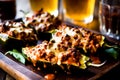 A close up of a plate with stuffed peppers and beer, AI