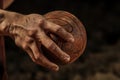 a close-up of a players hand gripping a handball