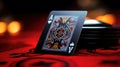 A close up of a playing card sitting on top of some plates, AI
