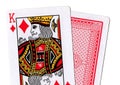Close up of playing cards with the king of diamonds revealed.