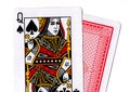 Close up of playing cards with the queen of spades revealed. Royalty Free Stock Photo