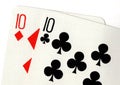 Close up of playing cards showing a pair of tens. Royalty Free Stock Photo