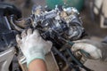 Close-up pliers, tools of a motorbike mechanic. Removing the rubber hoses attached to the motorbike body, the motorbike in the