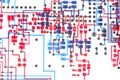 close up of a plotted circuit layout in red and blue