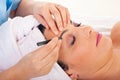 Close up of plucking eyebrows Royalty Free Stock Photo