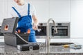 Toolbox and gloves on countertop Royalty Free Stock Photo