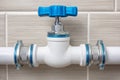 Close-up of a plumbing ball valve regulating water flow in a bathroom, showcasing its functionality and design Royalty Free Stock Photo
