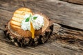 Close up poached egg with liquid yolk with fresh leaves on toast on brown rustic wooden background. English muffin. egg Royalty Free Stock Photo