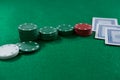 Close-up of poker chips and cards on table Royalty Free Stock Photo