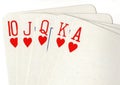 Close up of a poker hand of playing cards showing a royal flush. Royalty Free Stock Photo