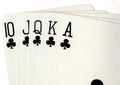 Close up of a poker hand of playing cards showing a royal flush. Royalty Free Stock Photo