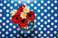 close-up of polka dot print on a glass vase