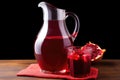 close-up of pomegranate juice on a glass pitcher