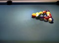 Close up of pool billiards balls on pool table with setup position and copy space Royalty Free Stock Photo