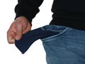 Close up of poor man in jeans showing his empty pocket isolated on white background Royalty Free Stock Photo