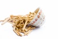 Close up of popular Indian and Asian ayurvedic herb i.e. Satavari or kurilo isolated on white in a glass bowl.