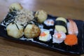 Close-up, popular Japanese food set, sushi, salmon rice ball, fresh sweet egg, delicious to eat, good food concept Royalty Free Stock Photo