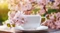 A close-up of a porcelain tea cup, filled with warm tea