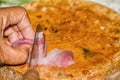 Close up The pork that is placed on the chopping block is being sliced by a knife. Royalty Free Stock Photo