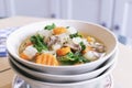 Close up of pork soup with mixed vegetables.