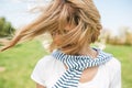 Close up portait of romantic happy female with blond blowing hair enjoy weather and sunny day outside. Portrait of beautiful young Royalty Free Stock Photo