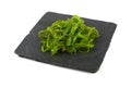 Close up portion of green wakame seaweed salad Royalty Free Stock Photo