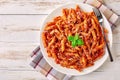 Close-up of a portion of penne arrabiata